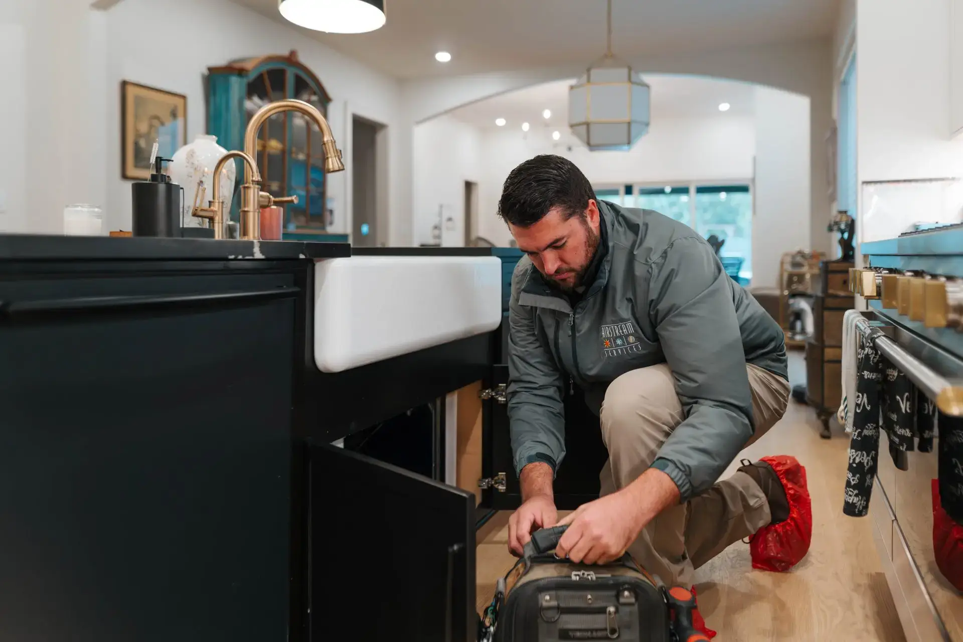 Airstream Services technician completing work at a residential property